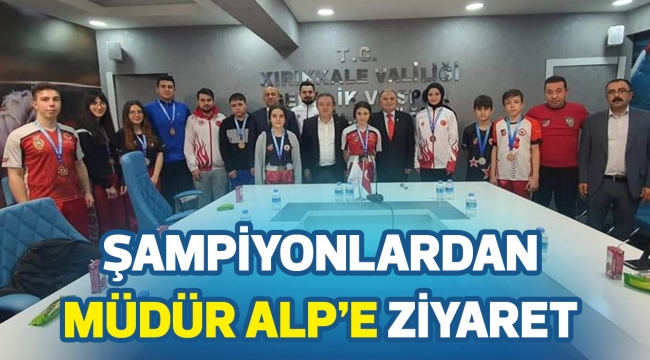 ŞAMPİYONLARDAN MÜDÜR ALP'E ZİYARET