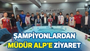 ŞAMPİYONLARDAN MÜDÜR ALP'E ZİYARET 